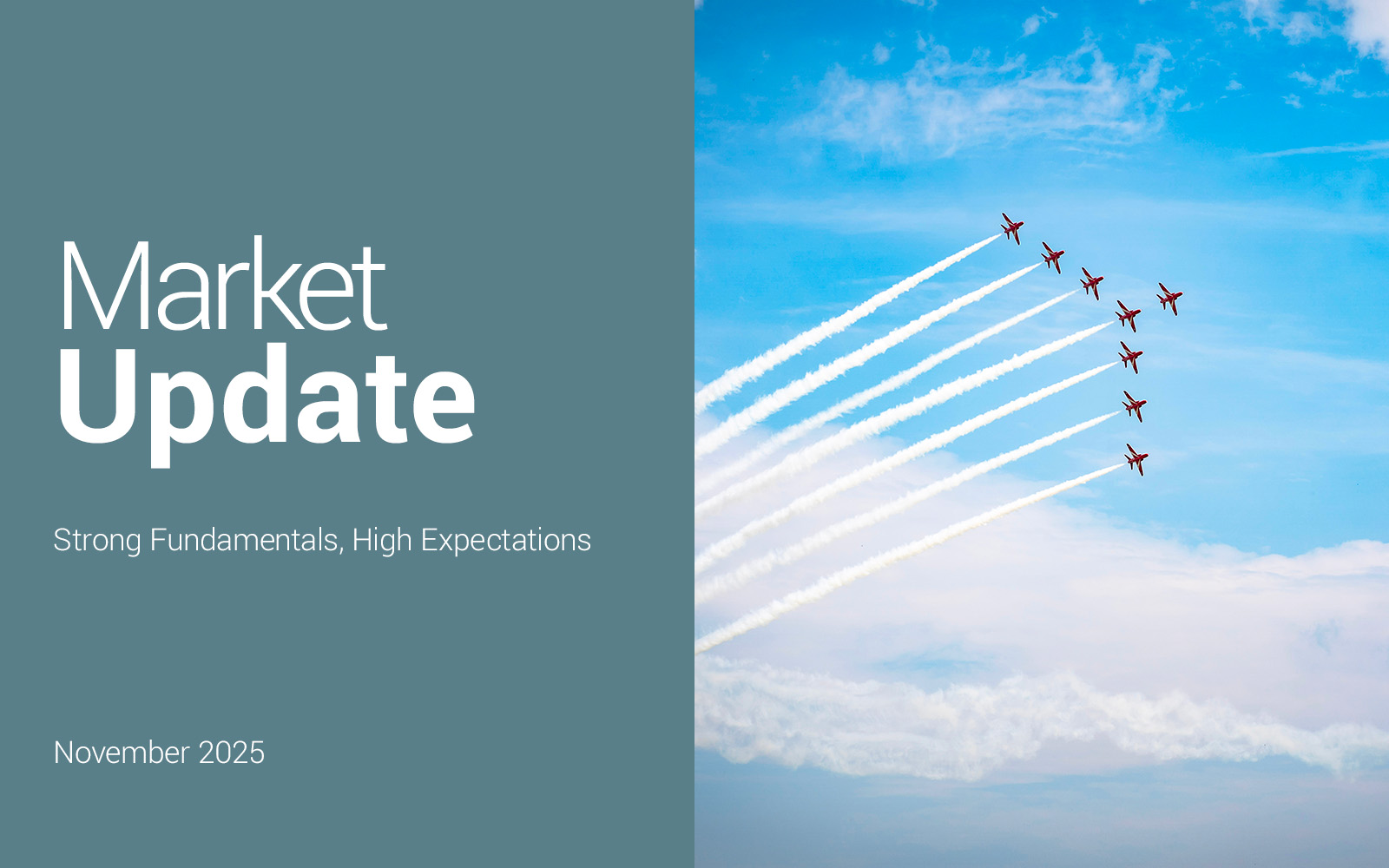 green grass field with trees and mountains in the distance